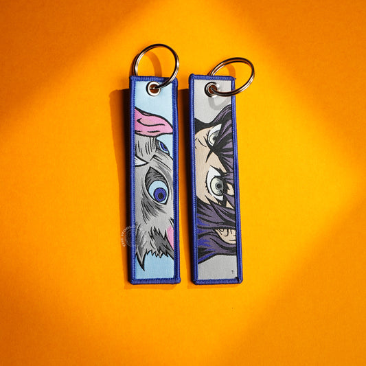 Shadows of Strength: Megumi and Maxim’s Duel Keychains