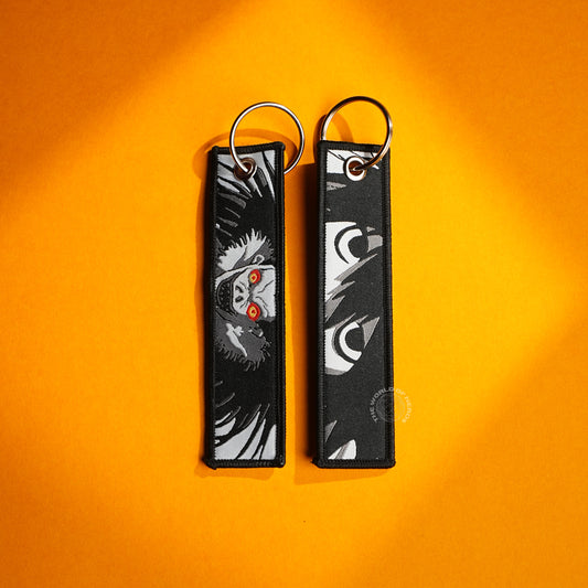 The Hunt Begins: Gon and Hisoka's Shadowy Encounter Keychains