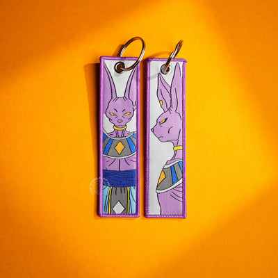 Beerus’ Fearsome Gaze: Embroidered Keychains