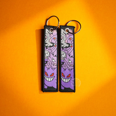 Gengar’s Haunted Smile: Ghostly Keychains with Fiery Eyes