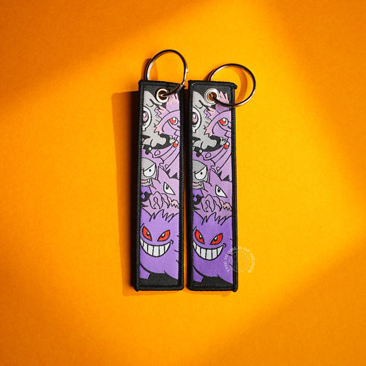 Gengar’s Haunted Smile: Ghostly Keychains with Fiery Eyes