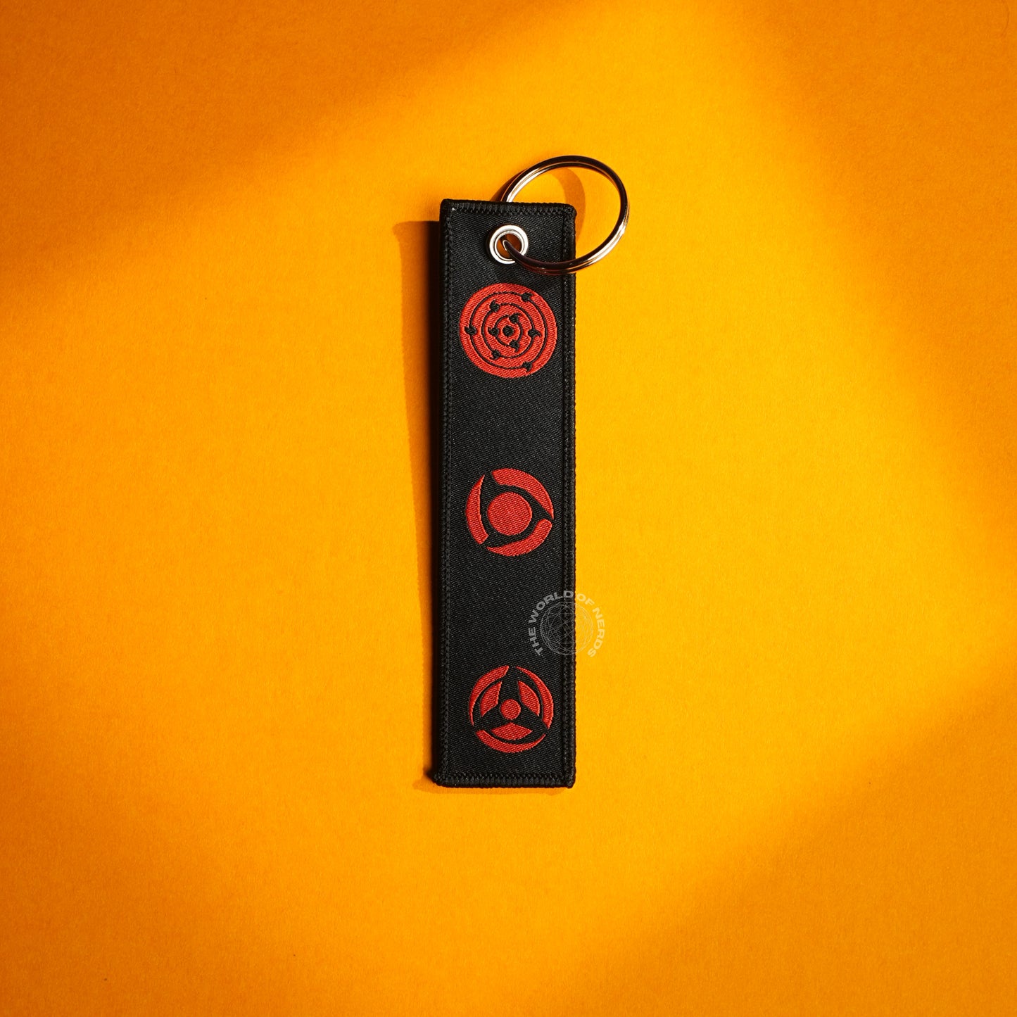 Stylish Black Keychain with Red Sharingan Patterns