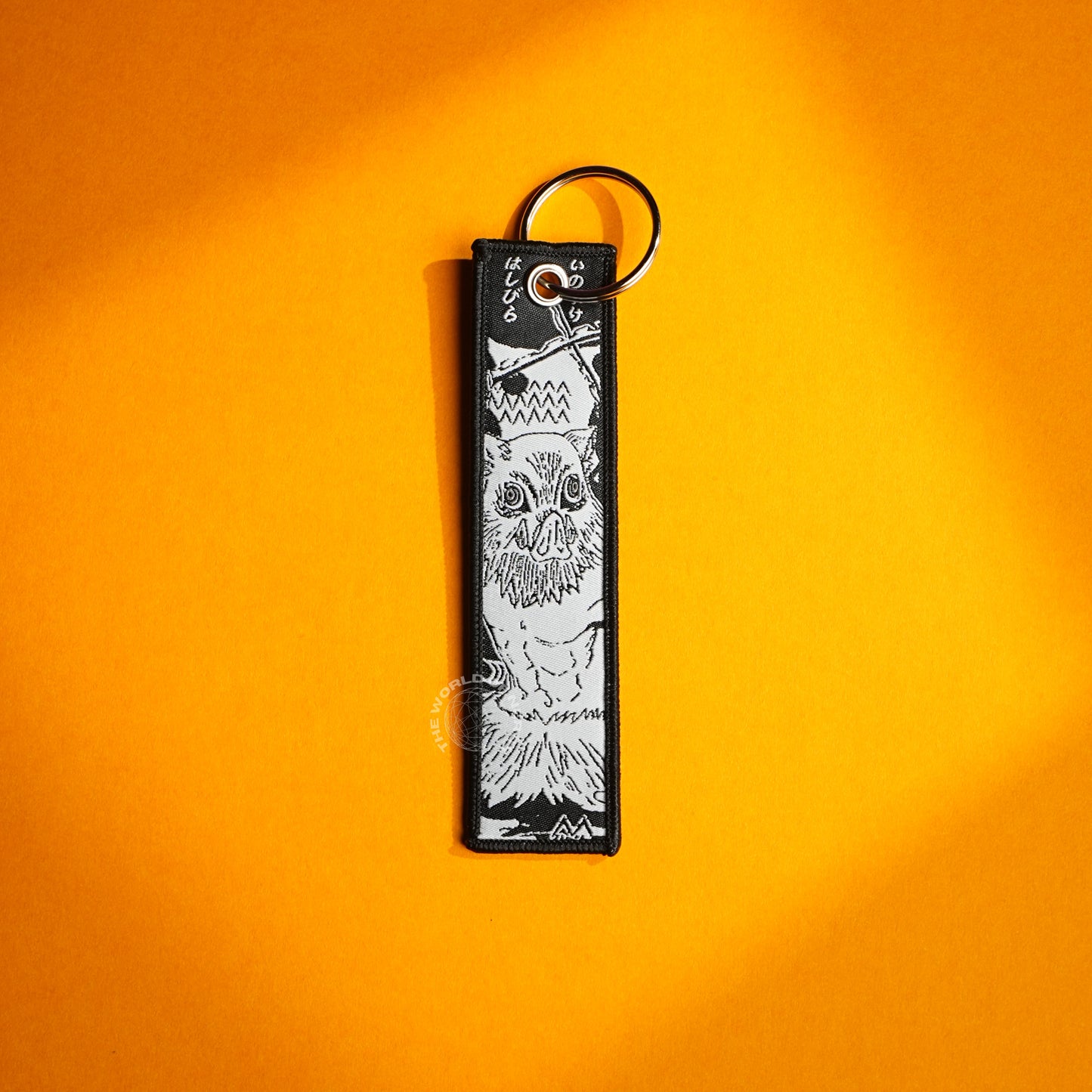 Demon Slayer Keychain – Inosuke and Shinobu in Iconic Artwork