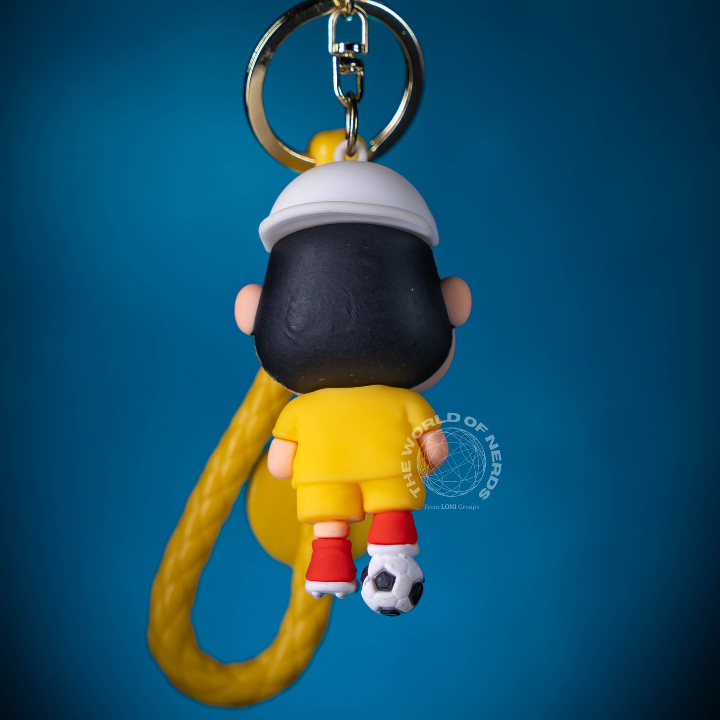 SHIN CHAN IN YELLOW JERSEY WITH FOOTBALL KEYCHAIN