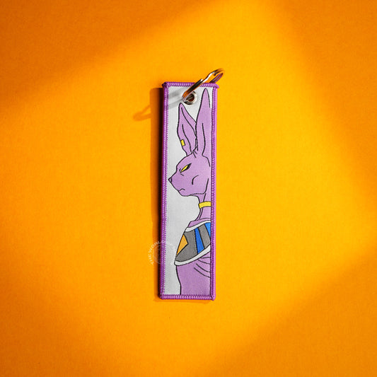 Beerus’ Fearsome Gaze: Embroidered Keychains