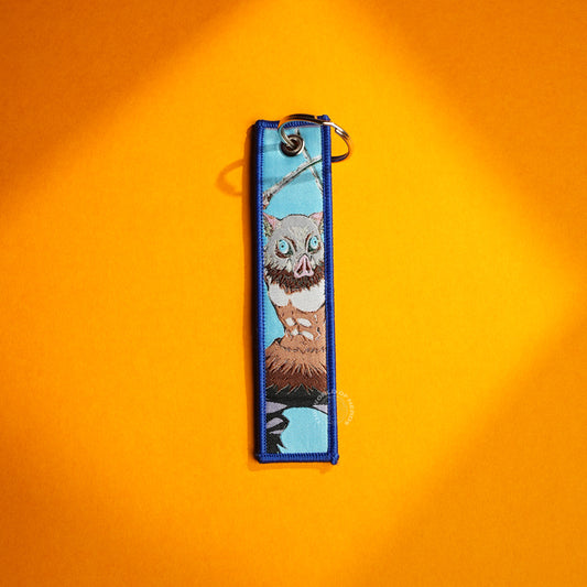 Demon Slayer Keychain – Inosuke and Shinobu in Stunning Artwork
