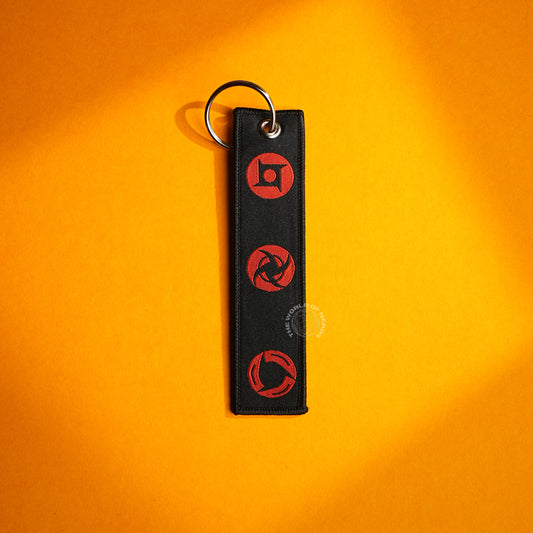 Stylish Black Keychain with Red Sharingan Patterns