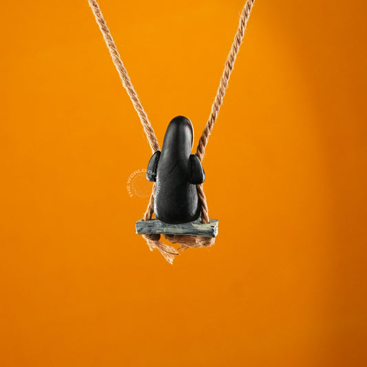 Minimalist Art of No-Face on a Rope Swing