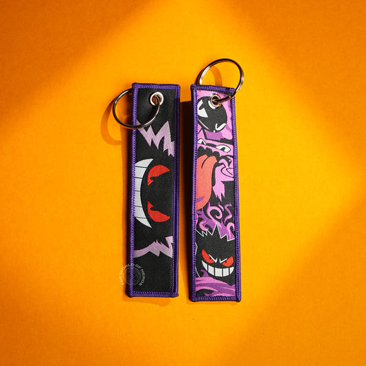 Gengar’s Grin: Fiery Eyes & Ghostly Design Keychains