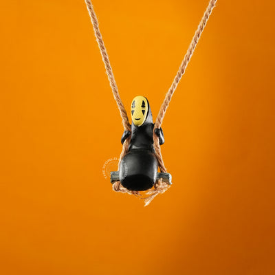 Minimalist Art of No-Face on a Rope Swing