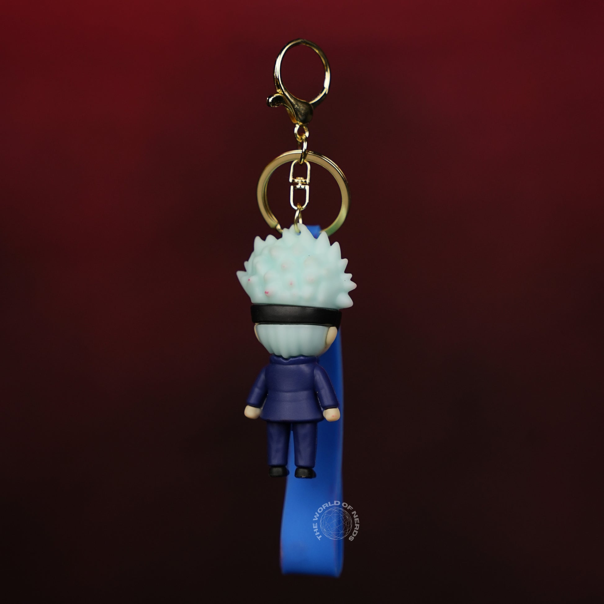 Keychain with character figure on a dark red background