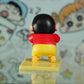 Shinchan Cartoon Statue Making a Goofy Expression
