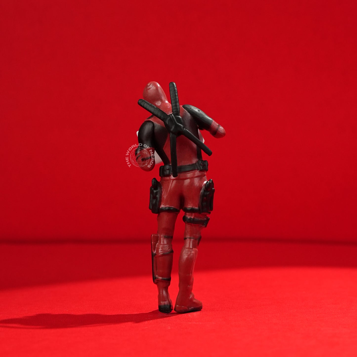 Bold Deadpool Figurine Holding Funny Sign